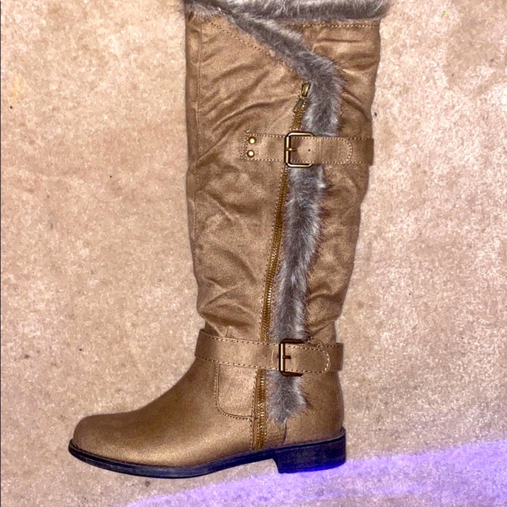 Knee high tanned boots